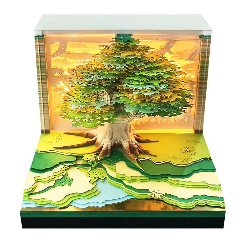 Intricate 2025 creative calendar with a layered tree design illuminated from within