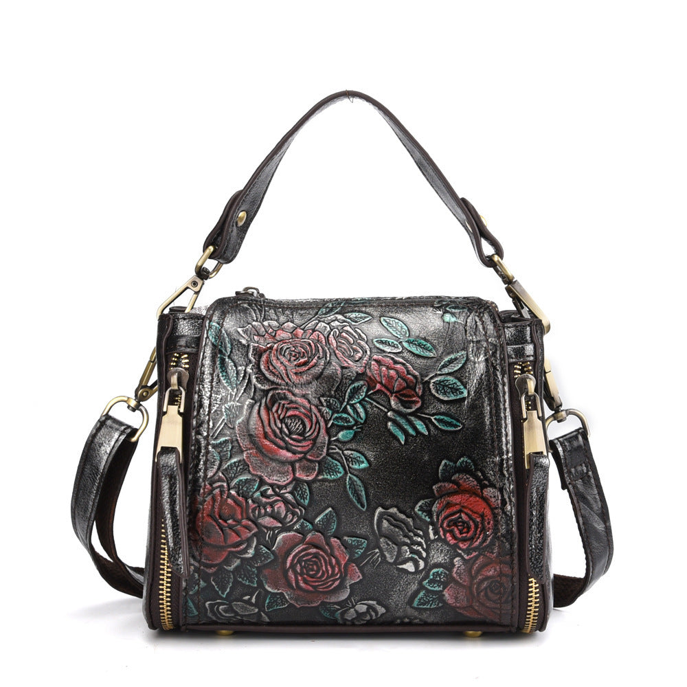 American designer leather handbag shoulder bag for women with embossed floral pattern in black