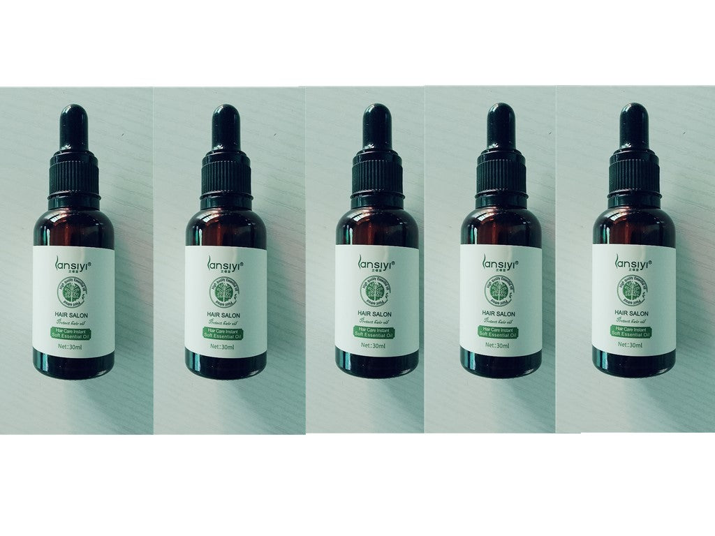 Yiwu Renfan hair care essential oil in dark glass dropper bottles with white labels