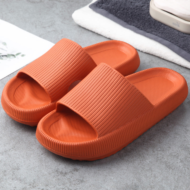 Hangzhou Jingqian orange couple slippers designed as comfortable indoor house slides with a textured strap and sole