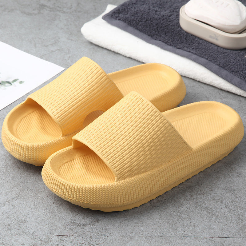 Yellow couple slippers by Hangzhou Jingqian featuring comfortable indoor house slides design