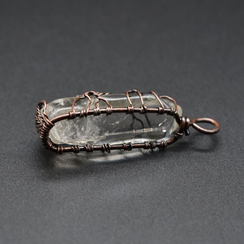 Fashion necklace featuring a clear crystal pendant wrapped in wire, perfect rainbow stone jewelry for wellness
