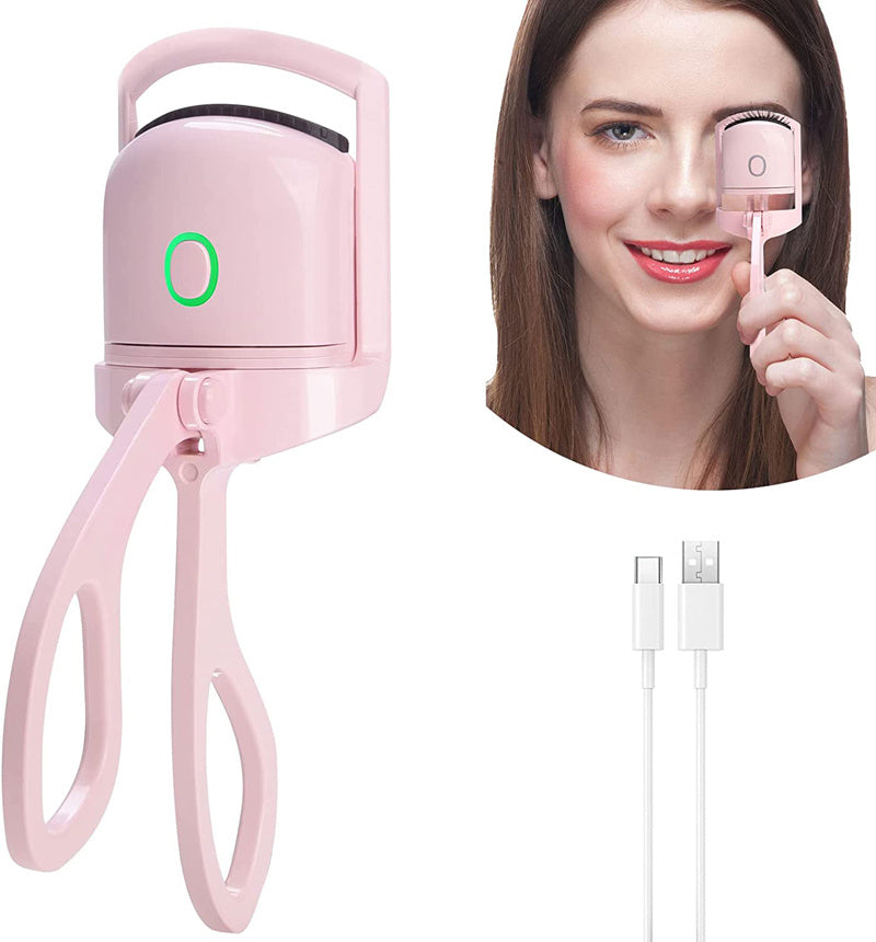 Popmarket pink electric heated eyelash curler with USB charging cable and model demonstrating use