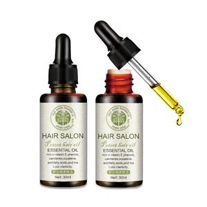 Yiwu Renfan hair care essential oil bottles with dropper showing nourishing yellow oil