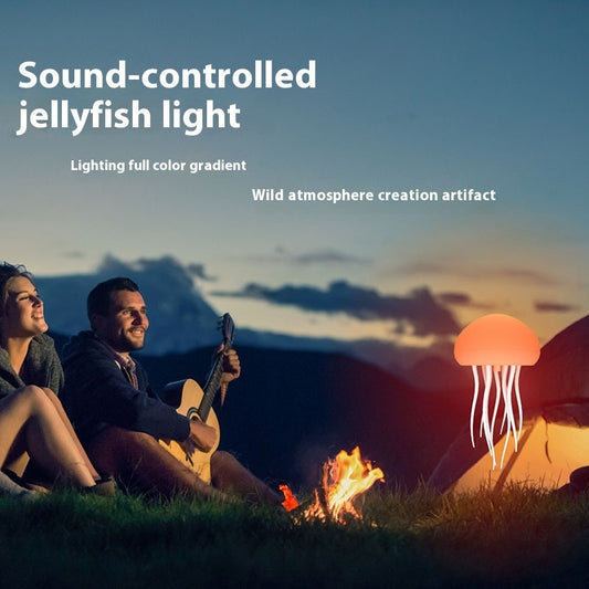Sound-controlled jellyfish lamp for desk creating a colorful ambient light outdoors with friends