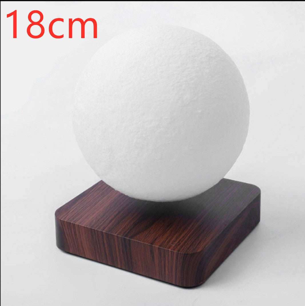 18cm Box of Pandora magnetic levitation moon lamp floating above wooden base