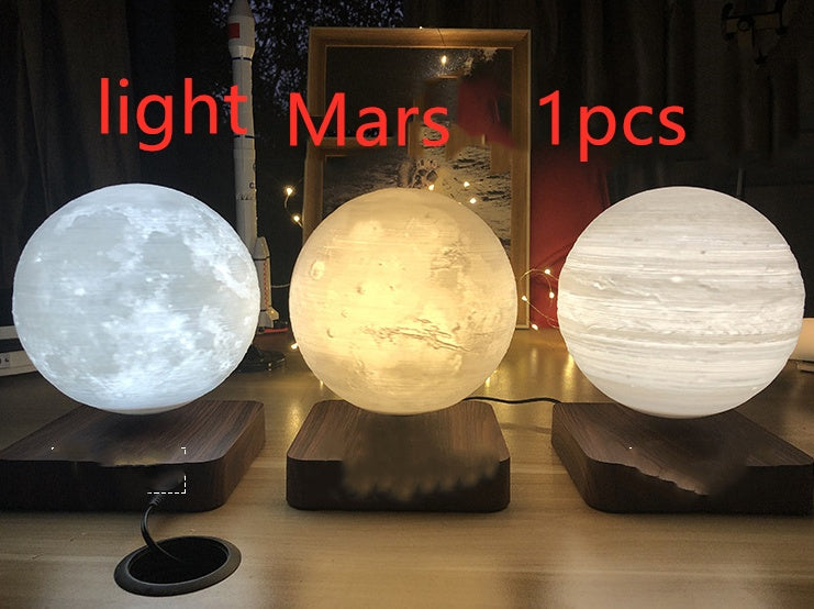 Box of Pandora magnetic levitation moon lamp showing Mars design glowing on wooden base