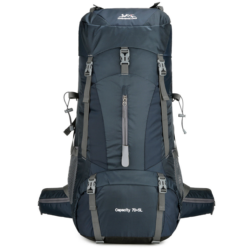 Dark blue mountaineering bag with hip belt adjustable straps mesh pockets 70L capacity large capacity hiking backpack