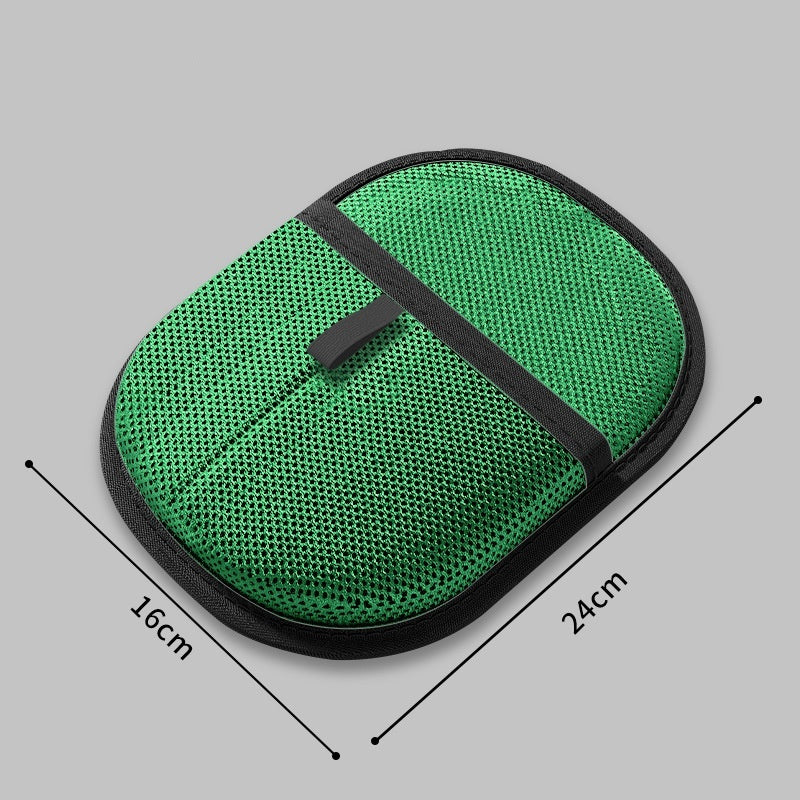 Green pet hair remover mitt with mesh fabric and black trim measuring 24 by 16 centimeters