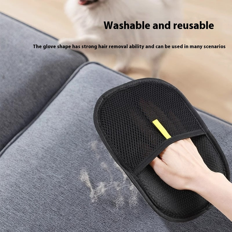 Black pet hair remover mitt glove removing pet hair from gray fabric couch