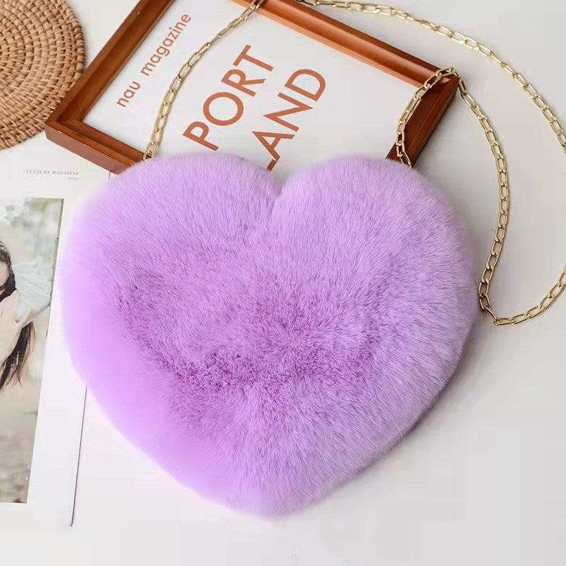 Plush heart shoulder bag for women in purple with a soft texture and stylish chain strap