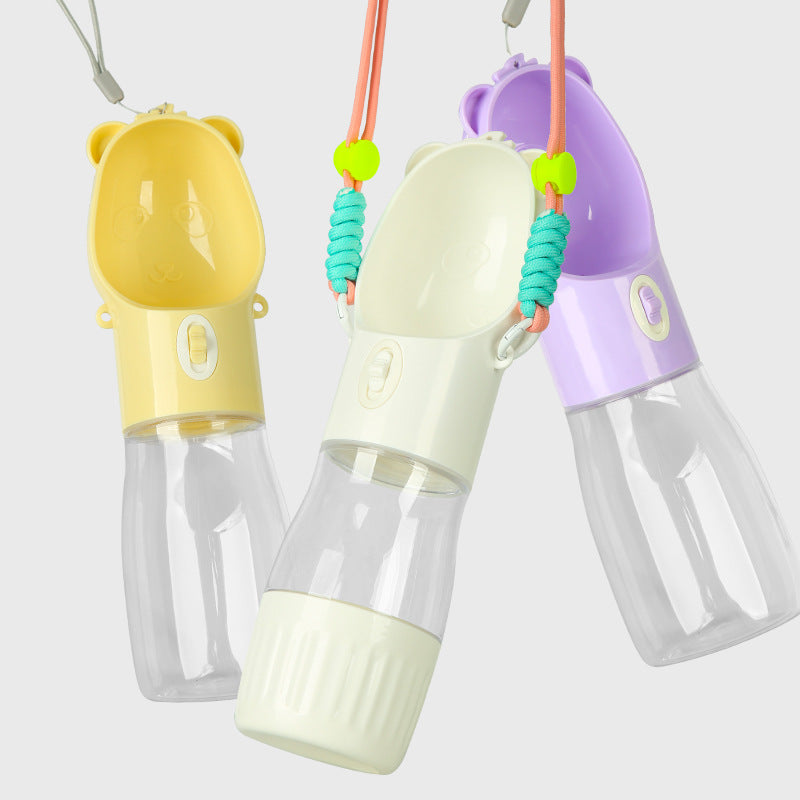 Portable dog water bottle for small and big dogs in yellow white and purple colors with attached lanyards