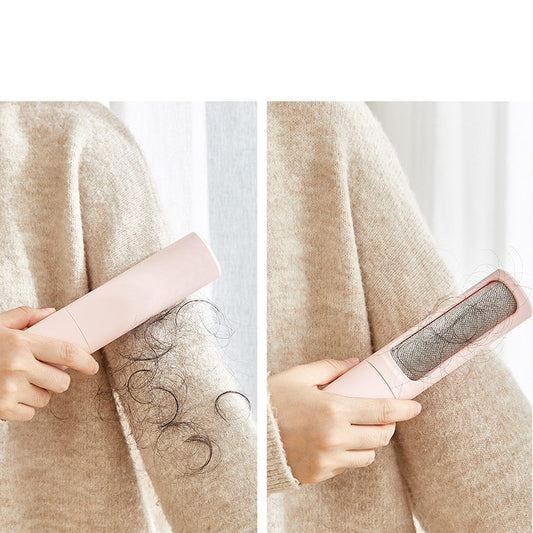 Reusable pet hair remover brush in pink removing hair from beige sweater with collected hair visible