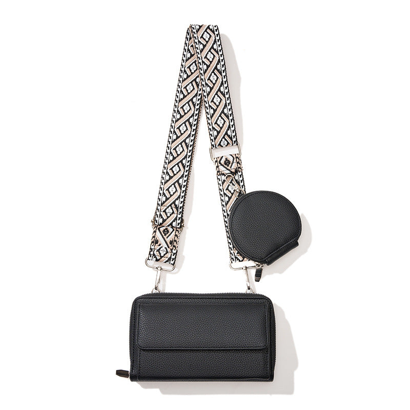 Stylish phone bag for women in black with patterned adjustable shoulder strap and round coin pouch
