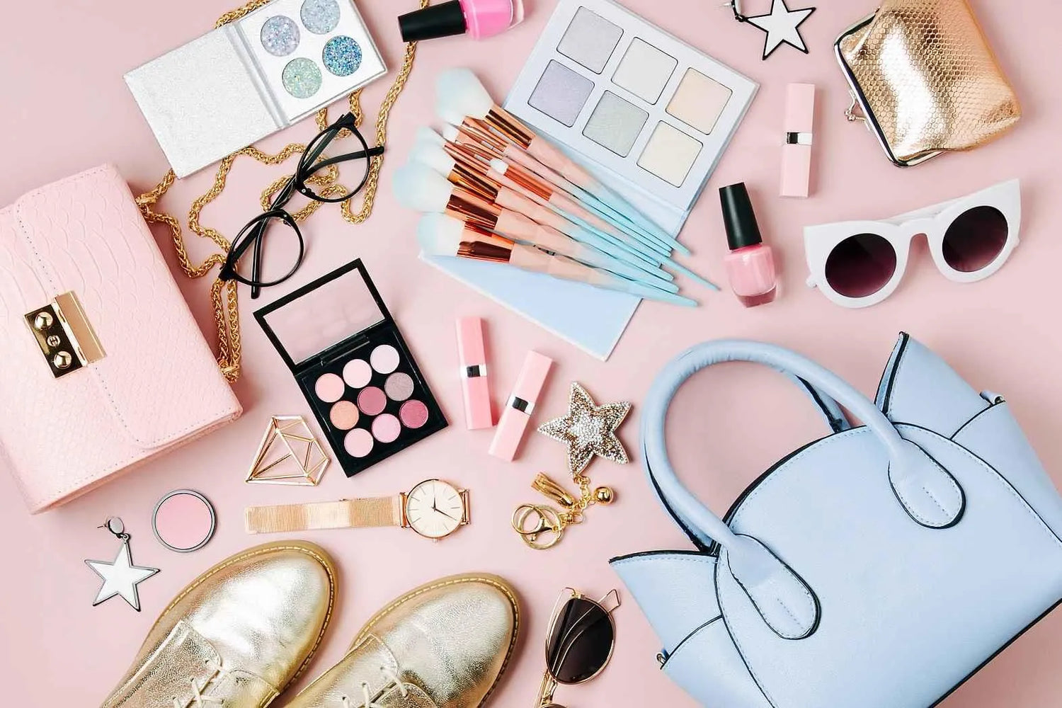 Flat lay of womens accessories and cosmetics including bags shoes sunglasses jewelry and natural beauty products for glowing skin