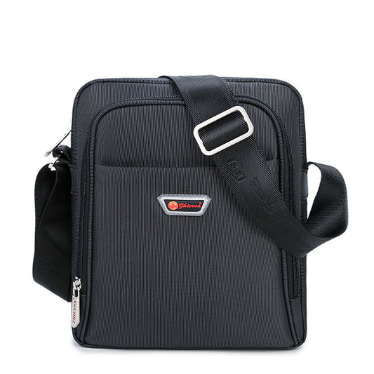 Black shoulder bag with a visible brand logo on a white background