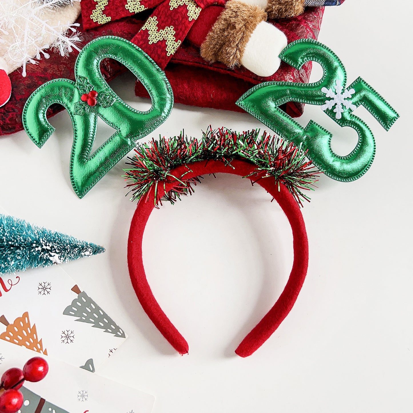 2025 Christmas headband for women with festive green numbers and a red felt base