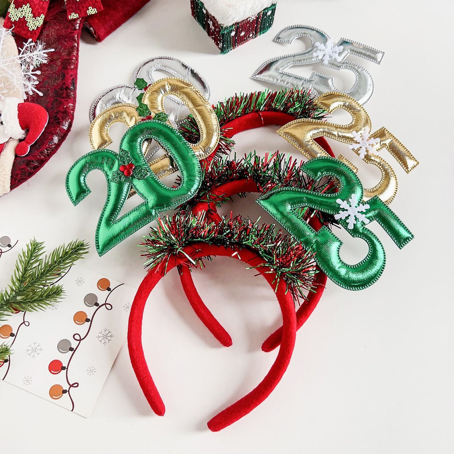 Festive 2025 Christmas headband for women with colorful numbers and decorative tinsel accents