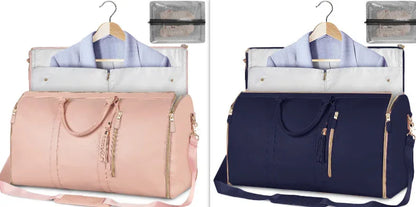 Two large leather garment travel bags with pink and navy colors, each with clothes hanger and packing cubes