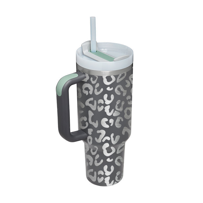 40 oz insulated tumbler with handle featuring gray leopard print design and white lid with straw