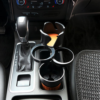 Adjustable car drink holder mounted in car center console with multiple cup compartments