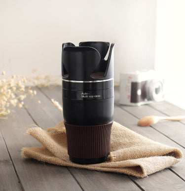 Black adjustable car drink holder cup bottle can holder door mount stand on a wooden table