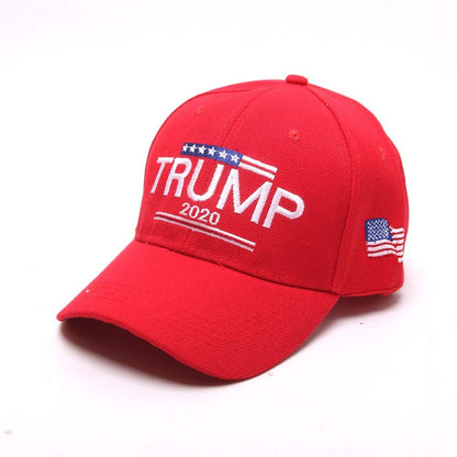 Red Trump 2020 adjustable USA baseball cap with embroidered American flag on side