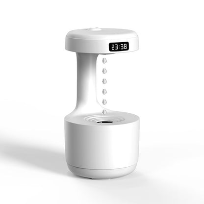 Yiwu Renfan anti gravity air humidifier white tabletop unit with LED clock and levitating water drop effect