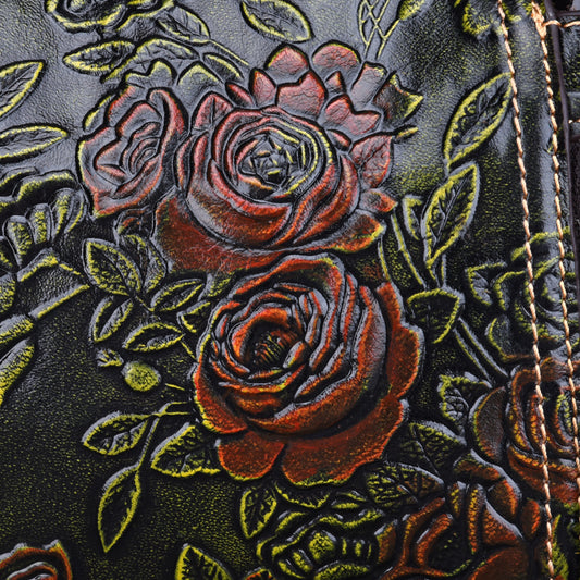 Close-up of embossed floral design on American designer leather handbag shoulder bag for women