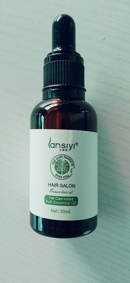 Yiwu Renfan hair care essential oil in a 30ml dark glass dropper bottle for hair salon use