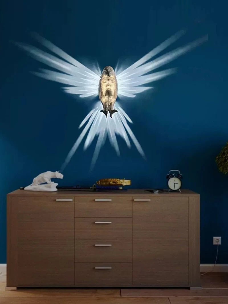 Hangzhou Jingqian modern bird wall lamp owl eagle shape projecting wing light pattern above wooden dresser