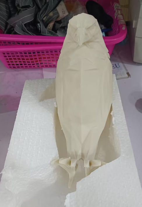 Hangzhou Jingqian modern bird wall lamp owl eagle shape in cream matte finish shown in foam packaging