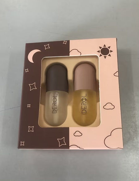 Yiwu Renfan Night Instant Volume Lip Plumper Oil Cle set with two bottles in night and day themed packaging