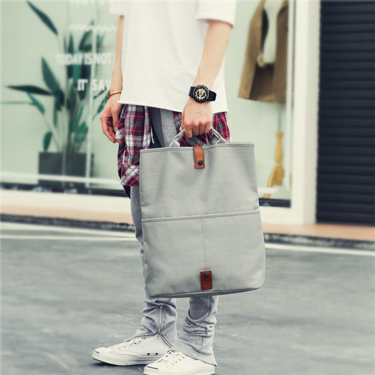 Stylish gray durable messenger bags for men with leather accents and comfortable handle