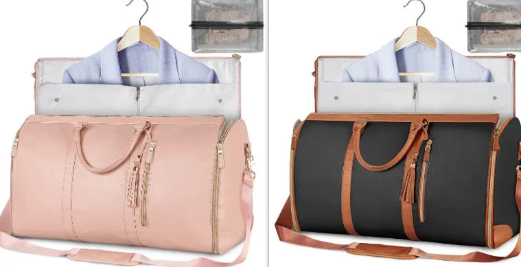 Two stylish travel garment bags in pink and black with brown accents, each holding a hanging blazer