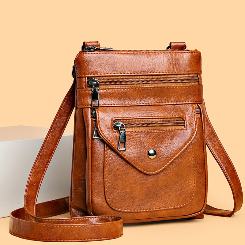Yiwu Renfan lightweight crossbody bag for women in brown faux leather with multiple zippered pockets