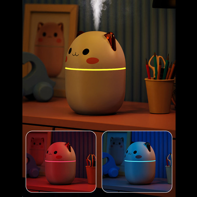 Hangzhou Jingqian cute cat air humidifier on bedside table emitting mist with color changing LED light