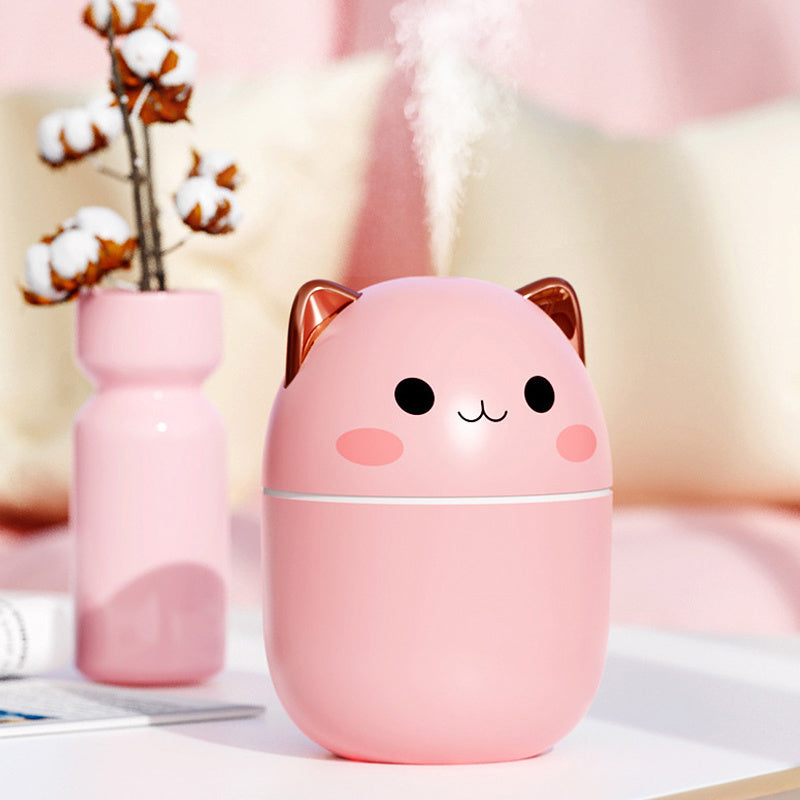 Pink Hangzhou Jingqian cute cat air humidifier with golden ears and smiling face emitting mist
