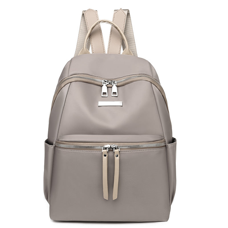 Stylish Korean style oxford backpack for women with sleek design and multiple zippered compartments