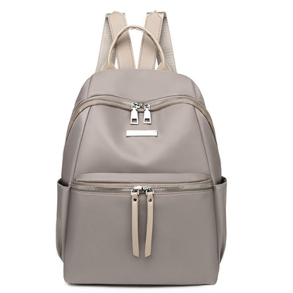 Stylish Korean style oxford backpack for women with sleek design and multiple zippered compartments