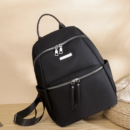 Korean style oxford backpack for women in black with dual zipper pockets and adjustable straps
