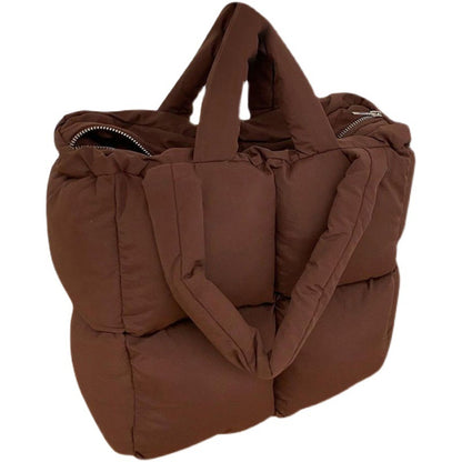 Large capacity padded tote bag in brown with sturdy handles and zipper closure for everyday use