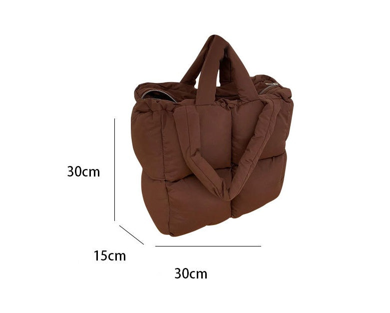 Brown large capacity padded tote bag with ample space and sturdy handles for everyday use