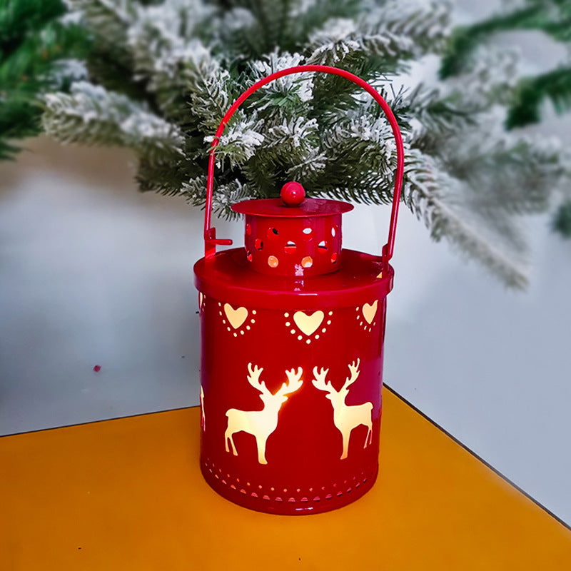 Red LED Christmas candle lanterns featuring reindeer and heart cutouts for festive decor