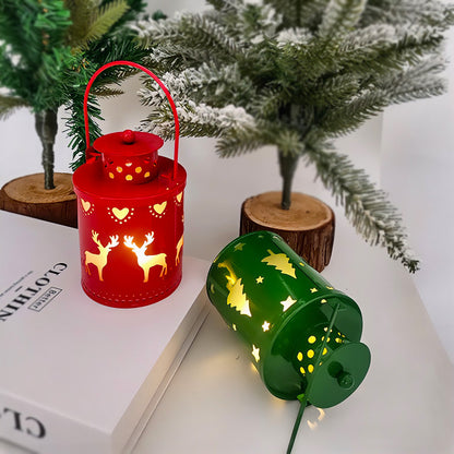 LED Christmas candle lanterns in red and green featuring festive silhouettes of reindeer and Christmas trees
