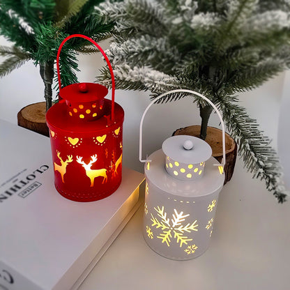 Two LED Christmas candle lanterns in red and white with festive cutouts, perfect for holiday decor