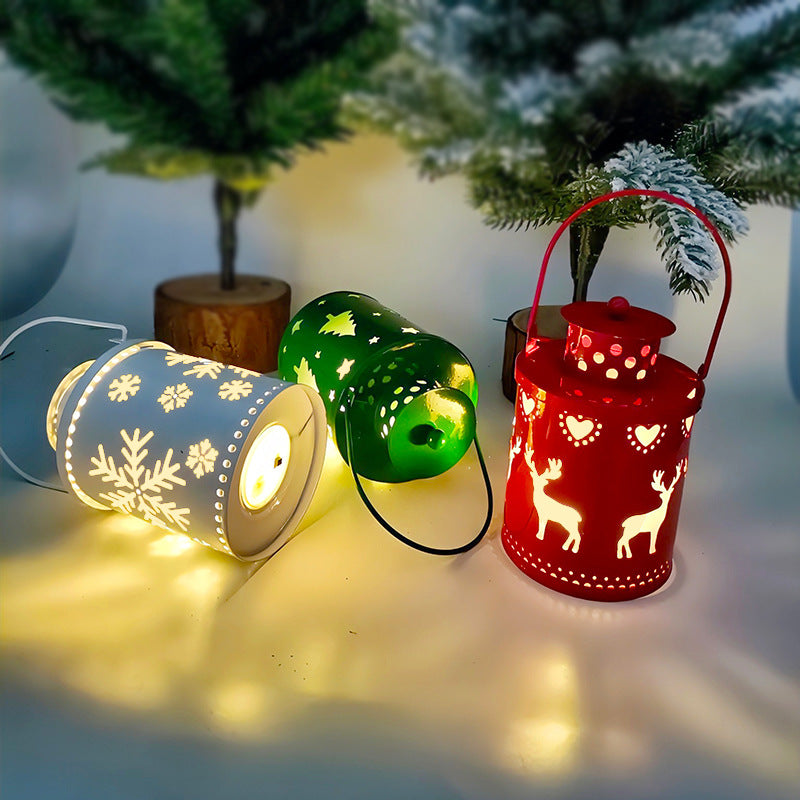 Decorative LED Christmas candle lanterns in red, green, and white designs for holiday ambiance