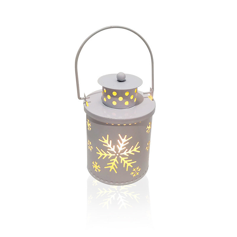 LED Christmas candle lanterns with decorative snowflake design, perfect for holiday ambiance