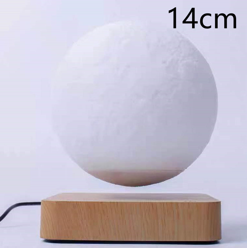 Box of Pandora magnetic levitation moon lamp floating above wooden base with 14cm moon sphere