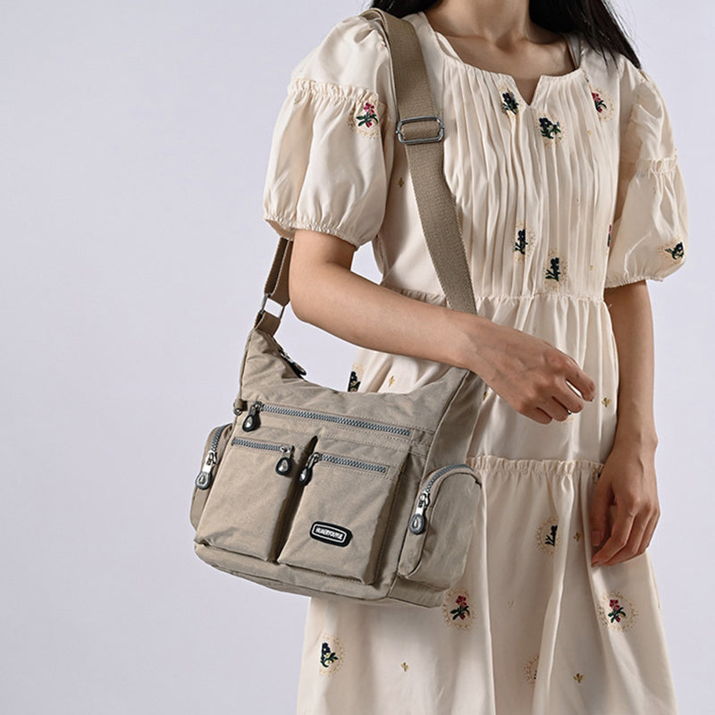 Beige multi pocket crossbody bag for women, ideal for daily use with multiple storage options